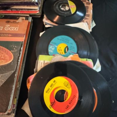 Sale Photo Thumbnail #261: Includes 50+ LPs and 50+ 45s. There is age related wear. Not tested.