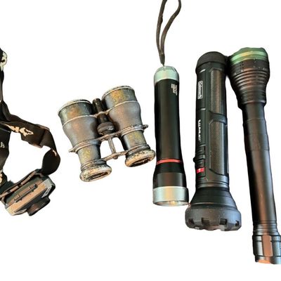 Sale Photo Thumbnail #288: Includes binoculars, early field binoculars, flashlights, and more. Total of 10 pieces.