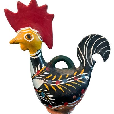 Sale Photo Thumbnail #307: This was handcrafted by the indigenous Lenca people of Honduras. It is hand painted and made from local clay, with an unglazed base. Measurement: 13.5”H x 12”W. Pre-auction estimate: $50-$100.