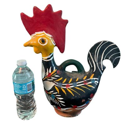 Sale Photo Thumbnail #308: This was handcrafted by the indigenous Lenca people of Honduras. It is hand painted and made from local clay, with an unglazed base. Measurement: 13.5”H x 12”W. Pre-auction estimate: $50-$100.