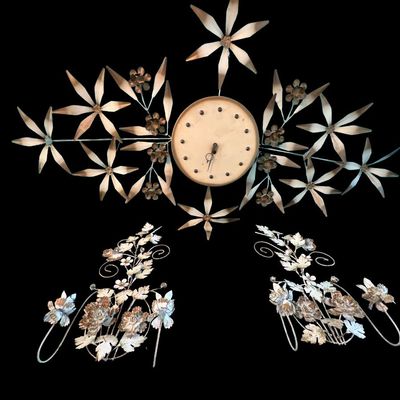 Sale Photo Thumbnail #310: Includes a large wall clock, and two candle sconces, from the mid-century. Total of three pieces. Clock not tested.