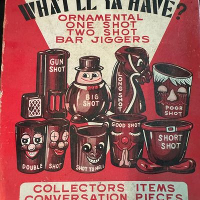 Sale Photo Thumbnail #318: Includes a mid-century NOS boxed set of novelty “What’ll Ya Have?” Bar jiggers and shot glasses made in Japan; a set of six “naughty” coasters; a Mabel’s Whore House glass mug; a vintage ice bucket; and more. Total of seven pieces.