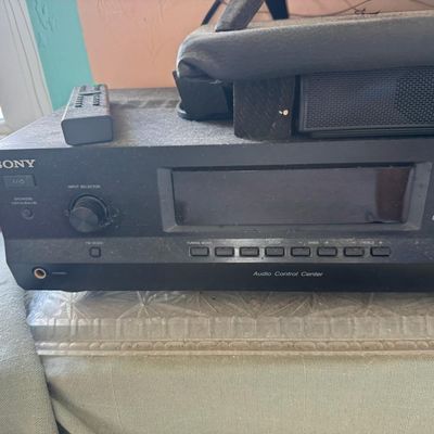 Sale Photo Thumbnail #323: Includes a 54” Roku television, a Magnavox VHS/DVD player, a Marantz Legacy Series cassette DA452, a Sony receiver, a JBL Bluetooth speaker, DVDs, a Wii console with two remotes, and more. Not tested.