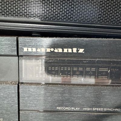Sale Photo Thumbnail #326: Includes a 54” Roku television, a Magnavox VHS/DVD player, a Marantz Legacy Series cassette DA452, a Sony receiver, a JBL Bluetooth speaker, DVDs, a Wii console with two remotes, and more. Not tested.