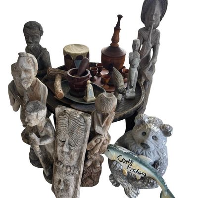 Sale Photo Thumbnail #386: Includes masks, statues, a drum, and a rattan table. Total of 15+ pieces.