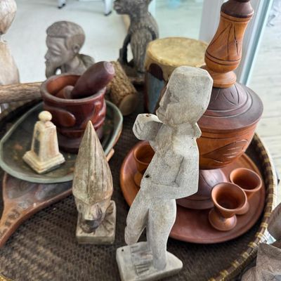 Sale Photo Thumbnail #388: Includes masks, statues, a drum, and a rattan table. Total of 15+ pieces.