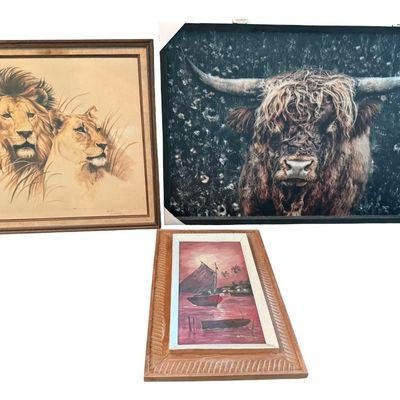 Sale Photo Thumbnail #405: Includes a like new bull print, a safari scene with lions, and a boat scene on canvas. Total of three pieces.