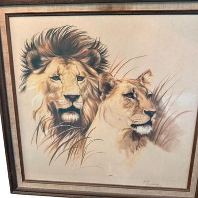 Sale Photo Thumbnail #407: Includes a like new bull print, a safari scene with lions, and a boat scene on canvas. Total of three pieces.