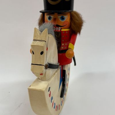 Sale Photo Thumbnail #135: Vintage Erzgebirge Germany Nutcracker 7.5” Horse Rider Rabbit Fur Soldier Wood, good condition.
