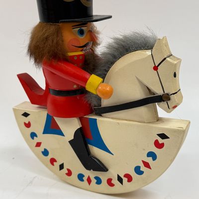 Sale Photo Thumbnail #130: Vintage Erzgebirge Germany Nutcracker 7.5” Horse Rider Rabbit Fur Soldier Wood, good condition.