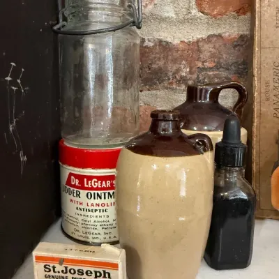 Sale Photo Thumbnail #26: Dr. LeGear's Udder Ointment tin and St. Joseph aspirin box