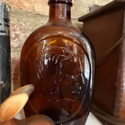 Sale Photo Thumbnail #30: Amber glass portrait flask with cork stopper