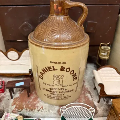 Sale Photo Thumbnail #46: Daniel Boone Pioneer Jug stoneware whiskey jug