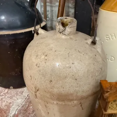 Sale Photo Thumbnail #51: Primitive stoneware jug with wire bail handle