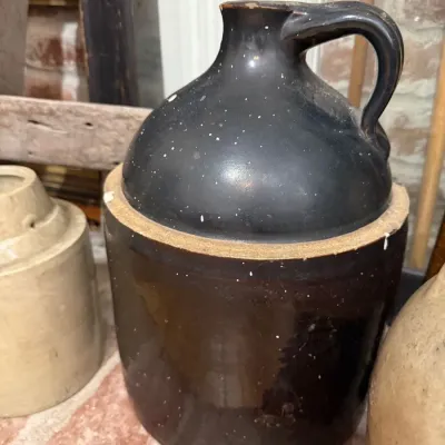 Sale Photo Thumbnail #52: Antique brown glazed stoneware whiskey jug