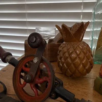 Sale Photo Thumbnail #71: Antique hand crank drill and carved wood pineapple