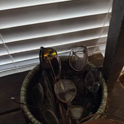 Sale Photo Thumbnail #81: Basket of vintage eyeglasses and frames