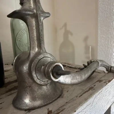Sale Photo Thumbnail #94: Vintage cast metal bar mount corkscrew