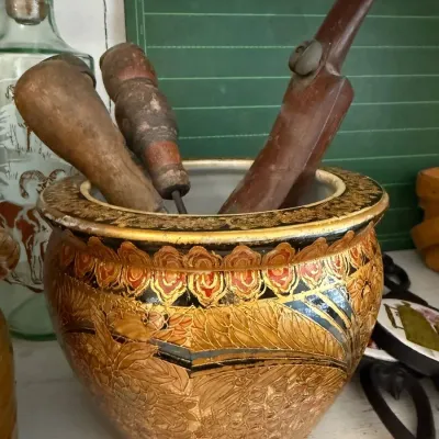 Sale Photo Thumbnail #111: Gilt ceramic jardiniere with antique wood tools