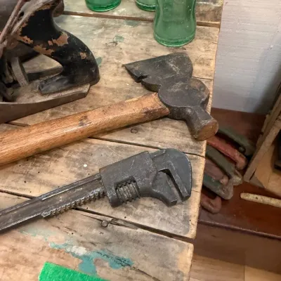 Sale Photo Thumbnail #136: Antique monkey wrench, hatchet and wood plane