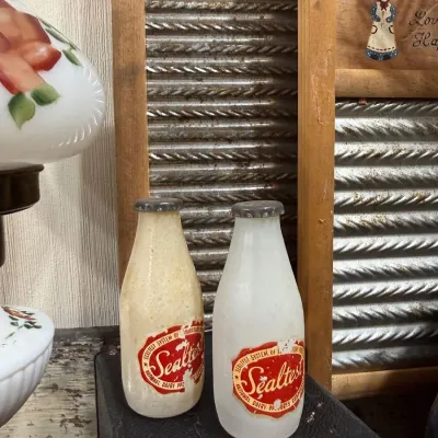 Sale Photo Thumbnail #229: Pair of vintage Sealtest glass milk bottles