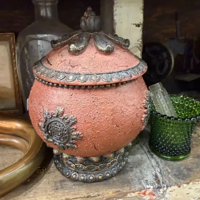 Sale Photo Thumbnail #257: Terracotta lidded jar with ornate metal trim
