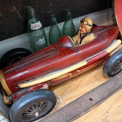 Sale Photo Thumbnail #294: Large vintage race car model with driver figure