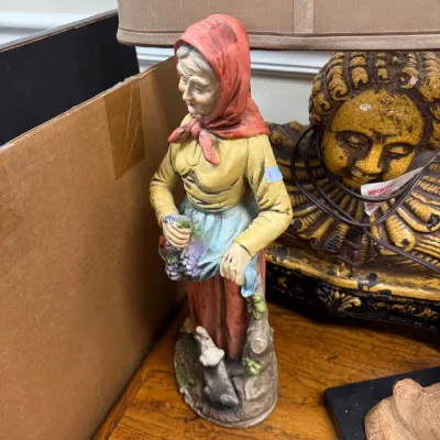 Sale Photo Thumbnail #353: Painted porcelain old woman with grapes figurine