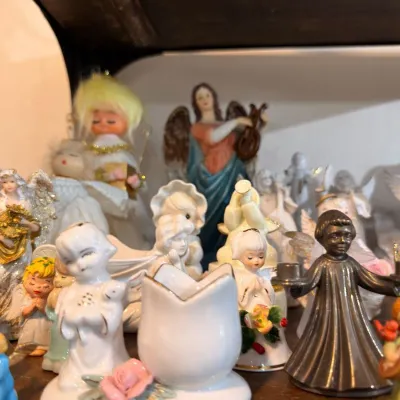 Sale Photo Thumbnail #551: Collection of porcelain angel figurines