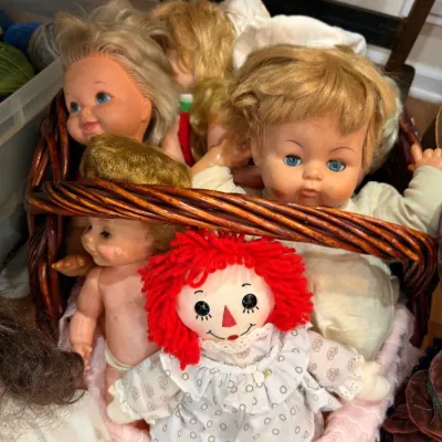 Sale Photo Thumbnail #557: Basket of vintage dolls with Raggedy Ann