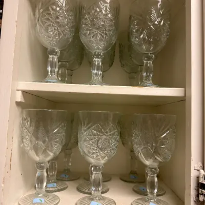 Sale Photo Thumbnail #588: Set of pressed glass goblets in cabinet