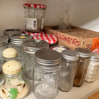 Sale Photo Thumbnail #612: Box lot of glass shakers and canning jars