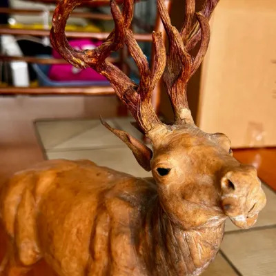 Vintage leather-wrapped deer figurine - mid-century bohemian interior decor.