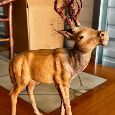 Vintage leather-wrapped deer figurine - mid-century bohemian interior decor.