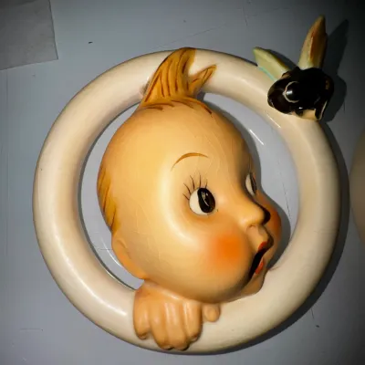 Pair of vintage Goebel M.I. Hummel "Ba-Bee Ring" girl & boy porcelain wall plaques