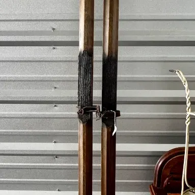 A pair of vintage wooden cross-country snow skis
