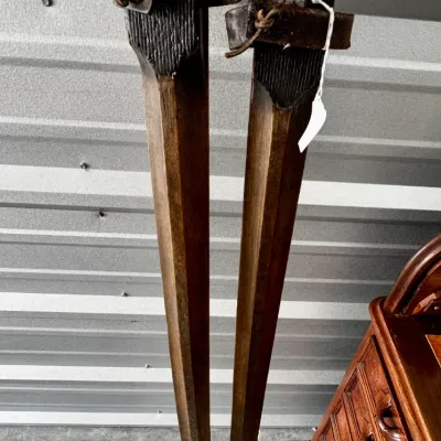 A pair of vintage wooden cross-country snow skis