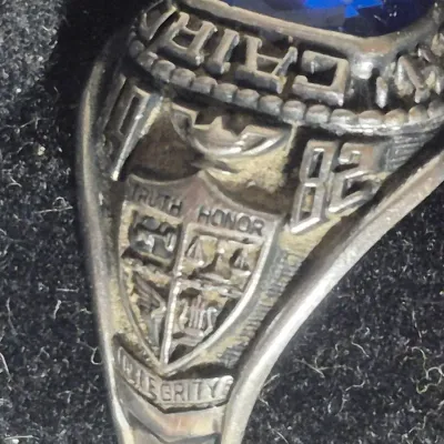 Sale Photo Thumbnail #31: Jostens Argentus  ~  1982 Cairo Durham, SC high school RING 
> sterling with palladium alloy 
> size :  11
excellent condition..............has original owner name inscribed inside