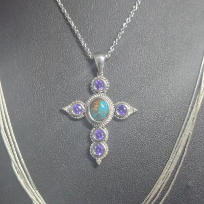 Sale Photo Thumbnail #91: Set 2 Necklaces & hoop Earrings
< glass inset Cross necklace is 16" choker 
> 5 strand thin necklace is 18" w/with cluster clasp
> small silver hoop earrings with pierced clasps