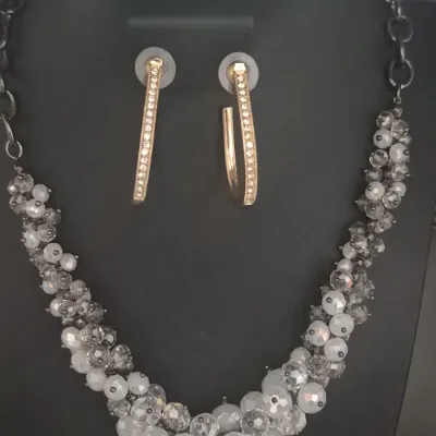 Sale Photo Thumbnail #94: Charter Club Costume Jewelry Chunky Gold Tone Pearl Necklace Set With Earrings
> necklace is 20" long, lobster clasp....excellent condtion
> earrings are 2"hoops, cz diamonds inset