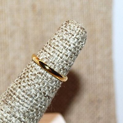 Size 4 Delicate Gold Colored No Stones Ring on a Gold Tone Band (1.0g)