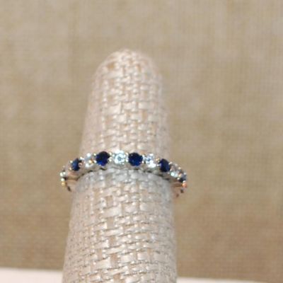 Size 6¼ Infinity Style Ring with Blue & Clear Alternating Stones on a Silver Tone Band (2.3g)