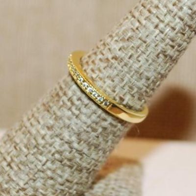 Size 7 Delicate Half Infinity Ring with Single Row of Tiny Stones on a Gold Tone Band (3.4g)