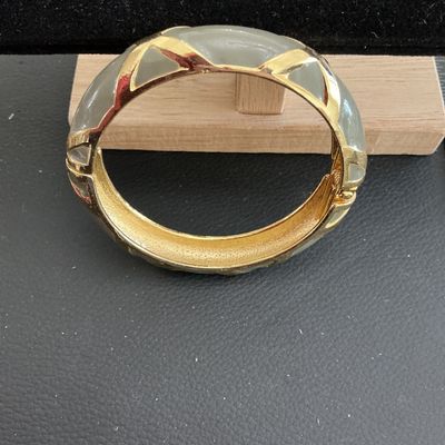 Sale Photo Thumbnail #106: Beautiful Gold Tone gray enamel Hinged Bracelet 
Please see attached pictures