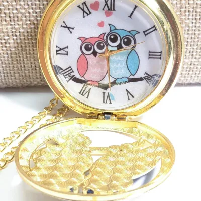 Sale Photo Thumbnail #21: Very Cute OWL POCKET WATCH with Blue/Green Feathers & Green Eyes, Gold Tone Setting and 30" L Chain/Lobster Clasp**EXTRA BATTERY INCLUDED**

QUARTZ
Non-rechargeable Battery
Brand: ALPHYNIX
Case Shape & Type: Round & Gold Colored
Display: Analog
Feature: S