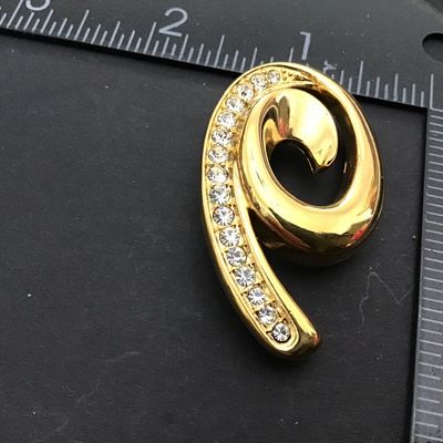 Monet Gold Tone Rhinestone Signed Brooch