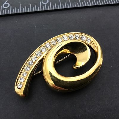 Monet Gold Tone Rhinestone Signed Brooch