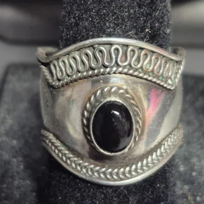 Sale Photo Thumbnail #14: Beautiful flawless sterling silver .925 mark onyx gemstone 
size:   6.5 ring
marked 925 at inside rim bottom