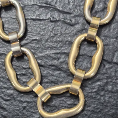 Sale Photo Thumbnail #84: Chunky 36" Chain Link BELT ~ "The Limited"
gold plated, toggle closure w/ ID tag
little sun exposure....no damage or repairs
Great for Jeans or casual long tops