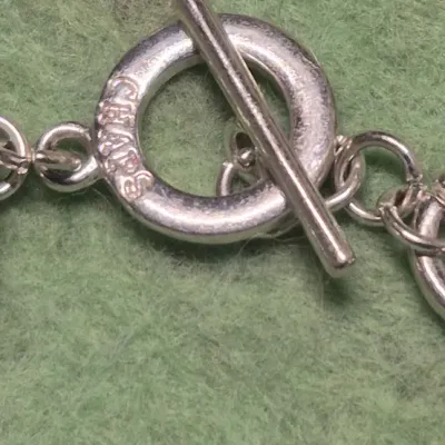 Sale Photo Thumbnail #120: Chaps silver tone link bracelet with toggle clasp....marked
Condition is Pre-owned.......excellent